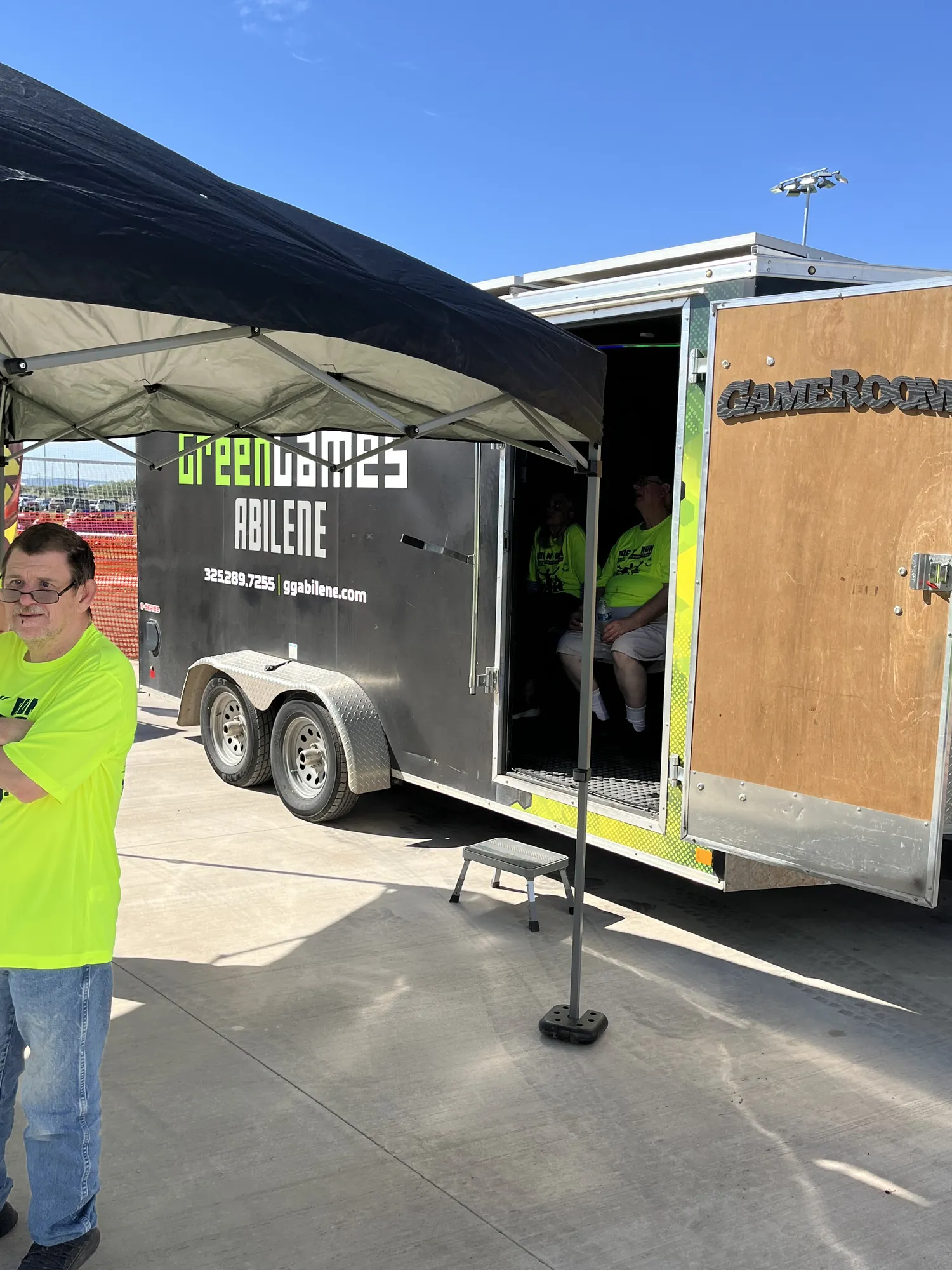 The Green Games Abilene trailer with a shade tent at the ROC soccer complex grand opening
